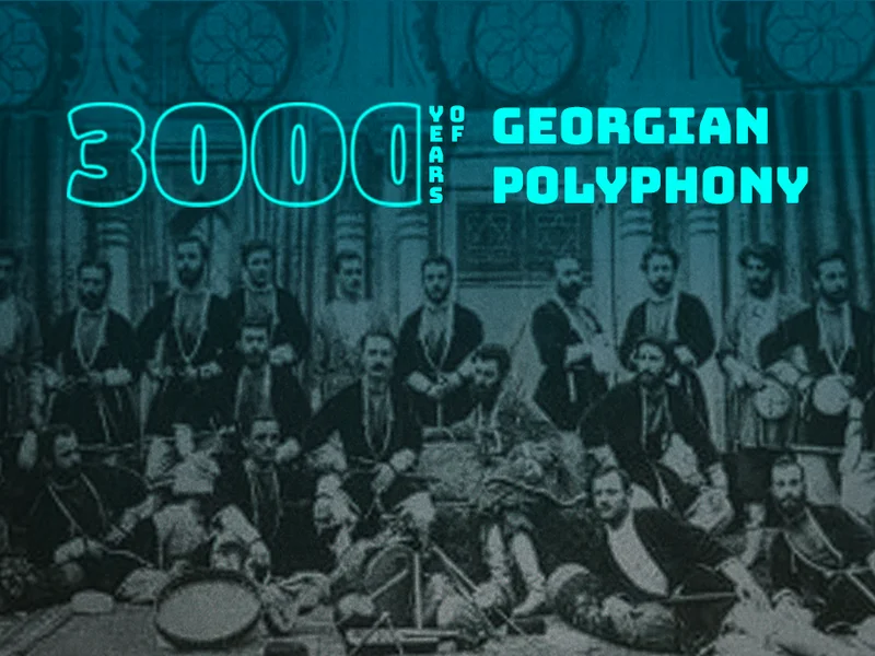 Blog card thumbnail showing a vintage Georgian polyphonic ensemble overlaid with the bold cyan typography 3,000 Years of Georgian Polyphony, displayed in the Kostava Creative blog feed and post listings